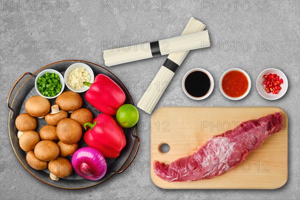 Top view of table with ingredient for pork mushroom Udon noodle