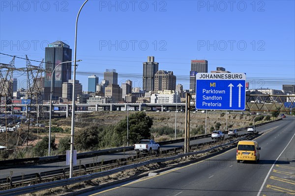 M1 motorway in front of the Johannesburg skyline