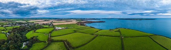 Panorama of Sunset over Fields and Farms from a drone