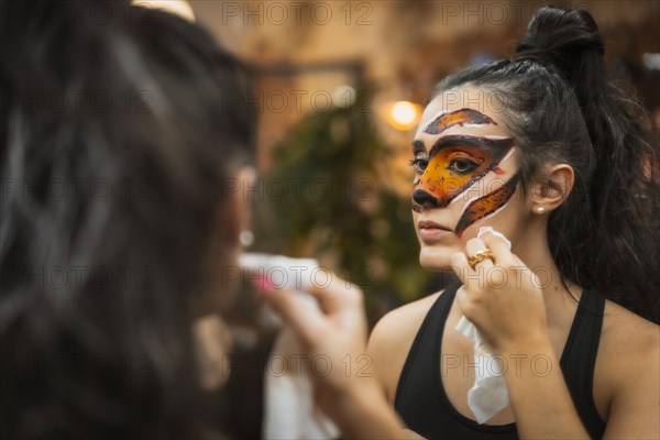 Halloween party hairstyle and makeup preparations