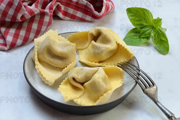 Freshly prepared tortelloni in shell