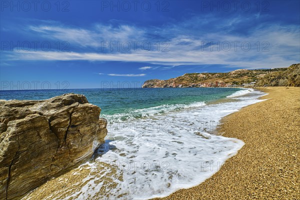 Sunny summer day on pebble and sandy beach Paleochori beach