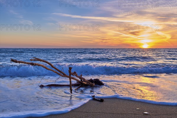 Sunset on sandy beach