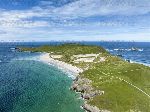 Aerial view of Faraid Head peninsula with dunes and sandy beach