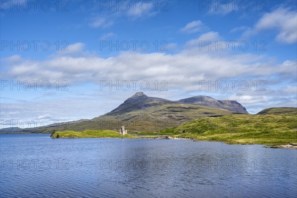 The ruins of Ardvreck Castle on a peninsula by the loch of Loch Assynt