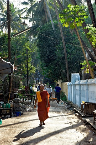 Monk in an alley