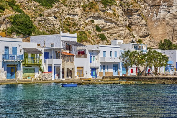 Close view of colorful village of Klima with Greek whitewashed houses on sunny day