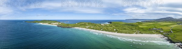 Aerial panorama of Balnakeil Bay with sandy beach and dunes on the right