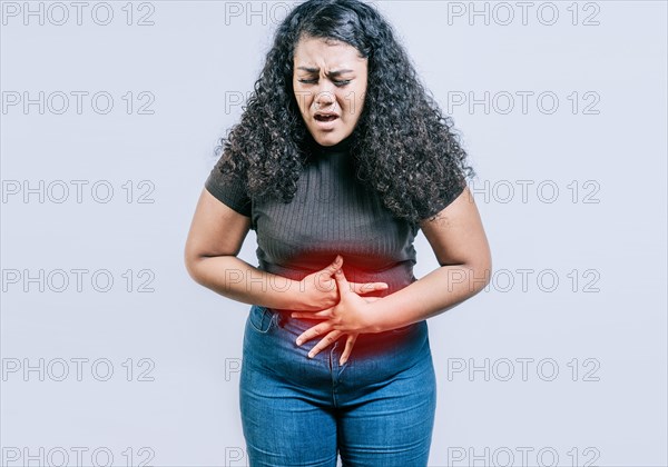 Young woman suffering stomach pain. People with stomach pain isolated