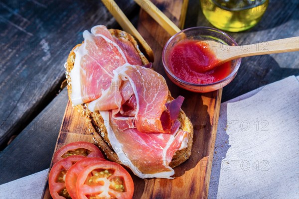 Top view of a typical Spanish breakfast of toast with virgin olive oil