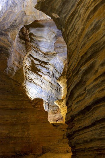 Entering the deep Lapinha cave open to visitation in Lagoa Santa in the state of Minas Gerais