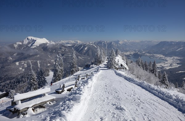 Deeply snow-covered Wamnderweg on the Zwoelferhorn