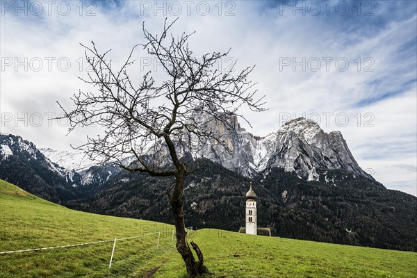 Snow-covered mountains and church