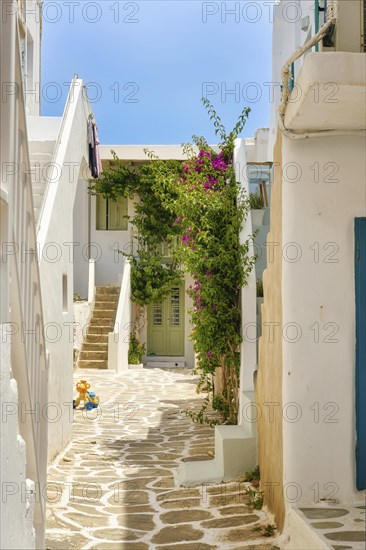 Traditional Greek island town square with whitewashed walls