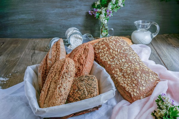 Loaves and loaves of rustic artisan bread made with different types of seeds and flours