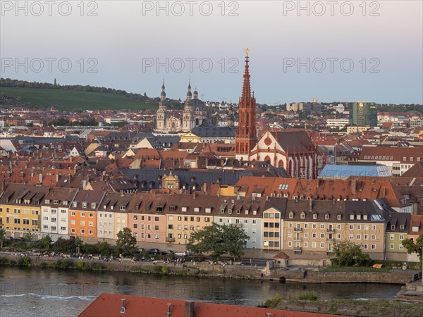 View of red Gothic Lady Chapel and Baroque Haug Abbey with dome