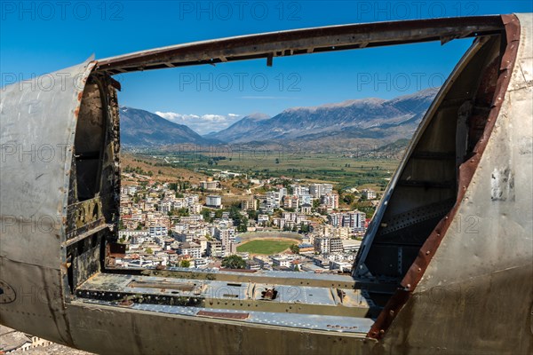 Looking over the city from the downed ancient fighter plane in the Ottoman castle fortress of Gjirokaster or Gjirokastra. Albanian