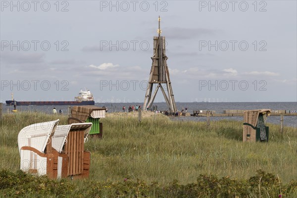 Beach chairs in front of the Kugelbake