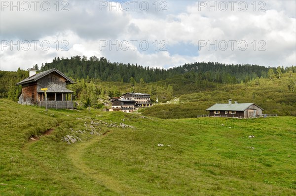 Alpine huts and the New Traunstein mountain hut of the German Alpine Club on the horse-rider Alm