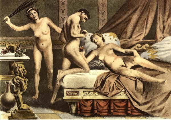 Man and two woman having sex