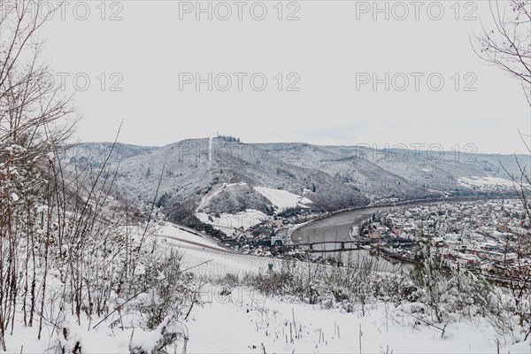 Snow covered landscape of Mosel Valley and river