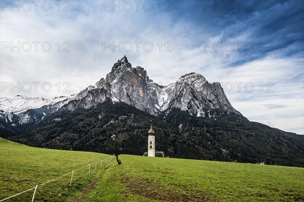 Snow-covered mountains and church