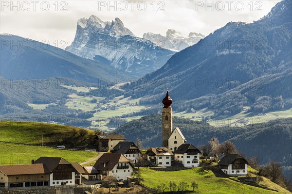 Snow-covered mountains and church