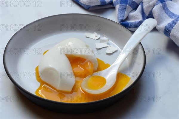 Soft boiled egg with spoon