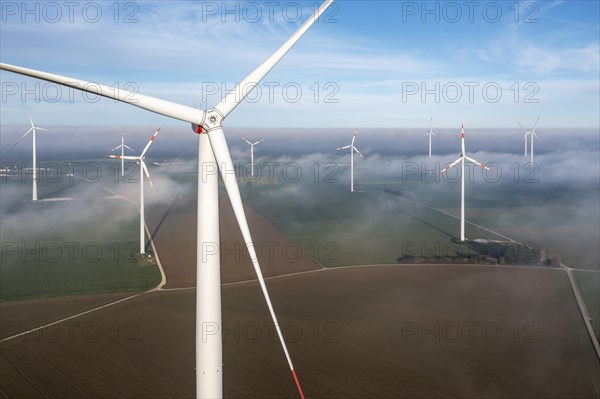 Tomerdingen wind farm in the Swabian Alb. Fog is rolling in