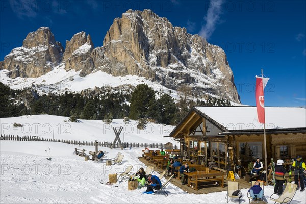Snow-covered mountains and ski hut