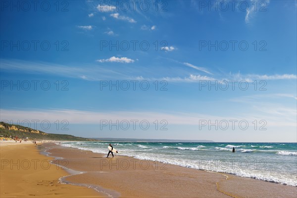 Sandy Atlantic ocean beach at Fonte da Telha beach