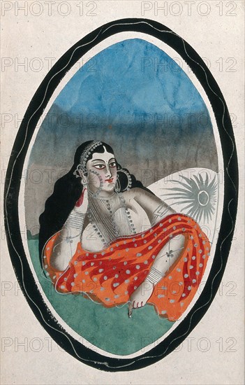 A courtesan reclining on cushions