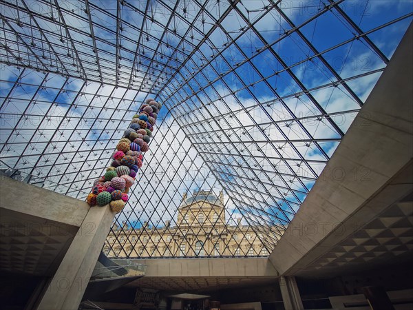 Underneath the Louvre glass pyramid. Beautiful architectural details with an abstract mixture of classical and modern architecture styles