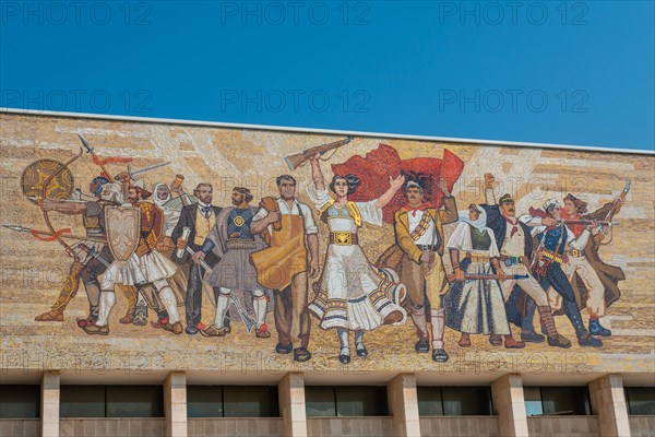 Beautiful painting of the revolution at the entrance to the National Historical Museum in Skanderbeg Square in Tirana. Albania