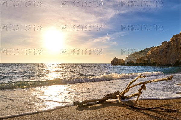 Sunset on sandy beach