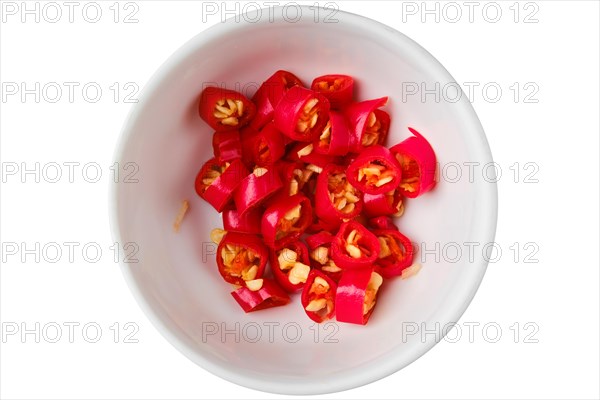 Top view of bowl with chopped chilli pepper