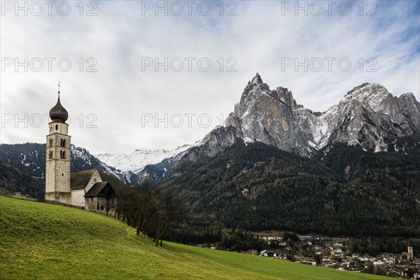 Snow-covered mountains and church