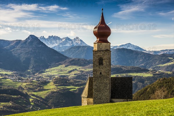 Snow-covered mountains and church