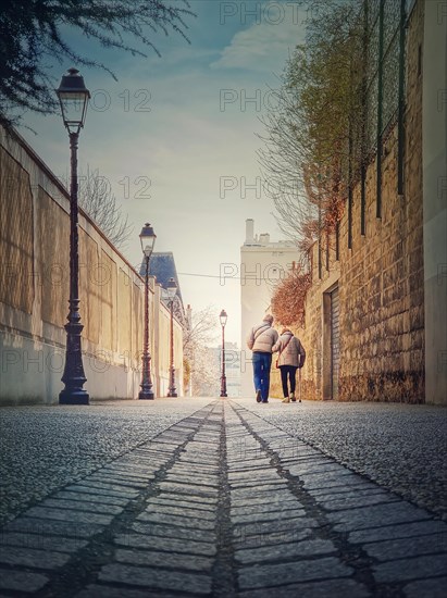 Senior couple walking outdoors together. Healthy lifestyle