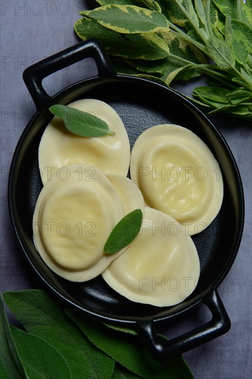 Tortellini and sage leaves