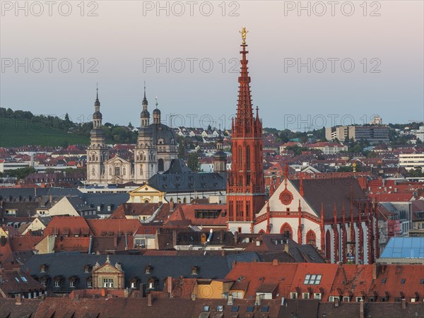 View of red Gothic Lady Chapel and Baroque Haug Abbey with dome