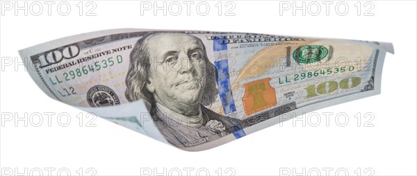 One hundred dollar bill falling or floating on empty background