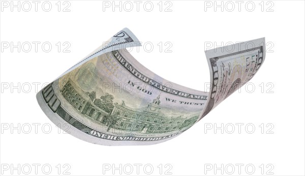 One hundred dollar bill falling or floating on empty background