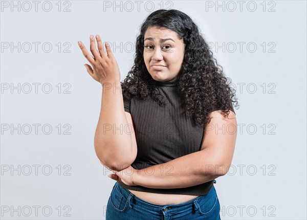 Puzzled woman gesturing with hand isolated. Girl with puzzled face frowning. Puzzled people making hand gestures