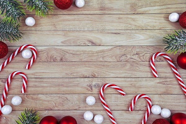 Seasonal Christmas flat lay with traditional red tree ornament baubles