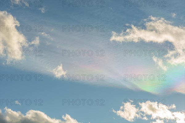 Quite rare optical phenomenon of iridescence of clouds of pearly