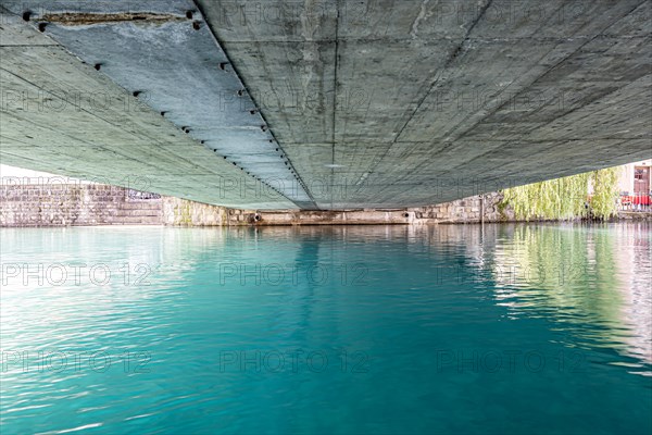 River Aare in City of Thun and Under the Bridge in a Sunny Summer Day in Thun