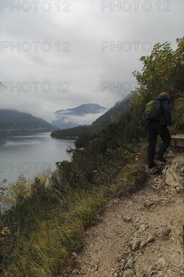 Hiking trail at the Achensee and view to the Achensee boat trip