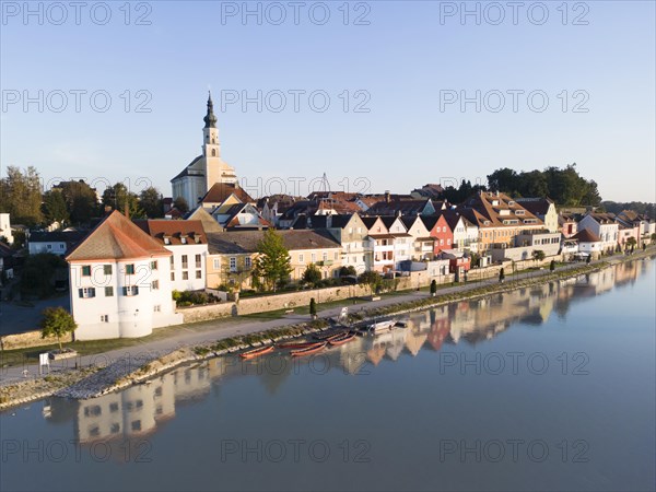 Riverbank promenade and town aerial view