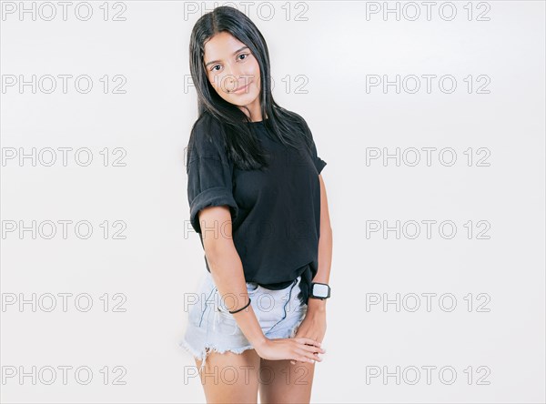 Portrait of attractive latin girl smiling isolated. Young girl with serene look on isolated background. Nicaraguan woman concept in isolated background